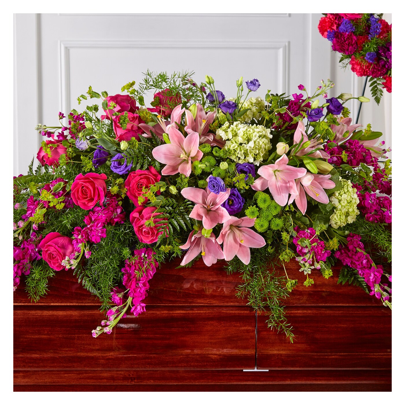 Radiant Tribute Casket Spray flower arrangement