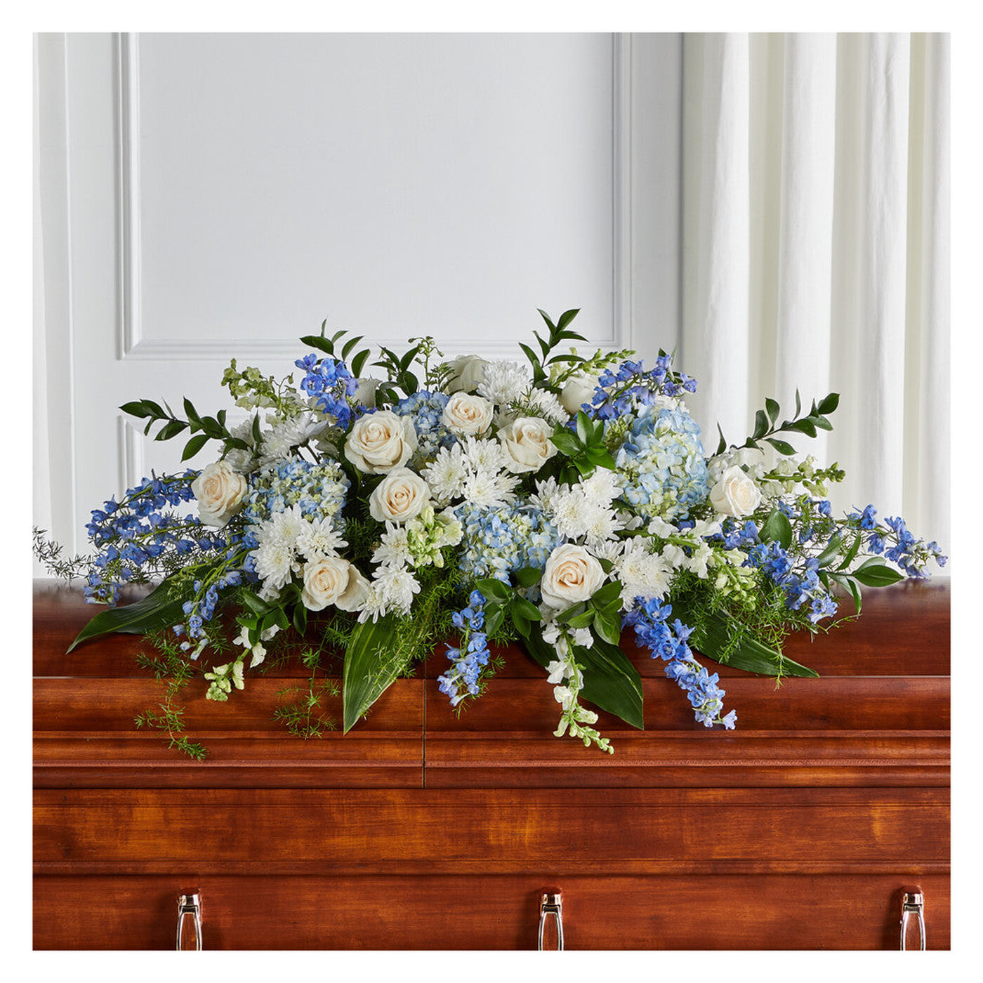 Timeless Essence Casket Spray flower arrangement